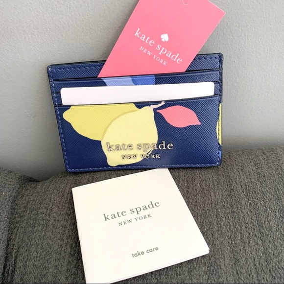 kate spade Handbags - NWT Kate Spade leather multi color wallet